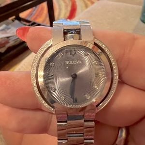 Women’s Bulova Watch - diamonds around face. Used gently